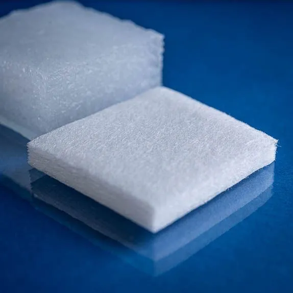 Type 2715 500gsm Superabsorbent Airlaid Laminated Nonwoven Fabric on a blue background. Close up of dry fabric sample