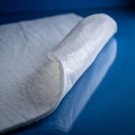 Type 2726 340gsm Superabsorbent Airlaid Fabric shown rolled on a blue background